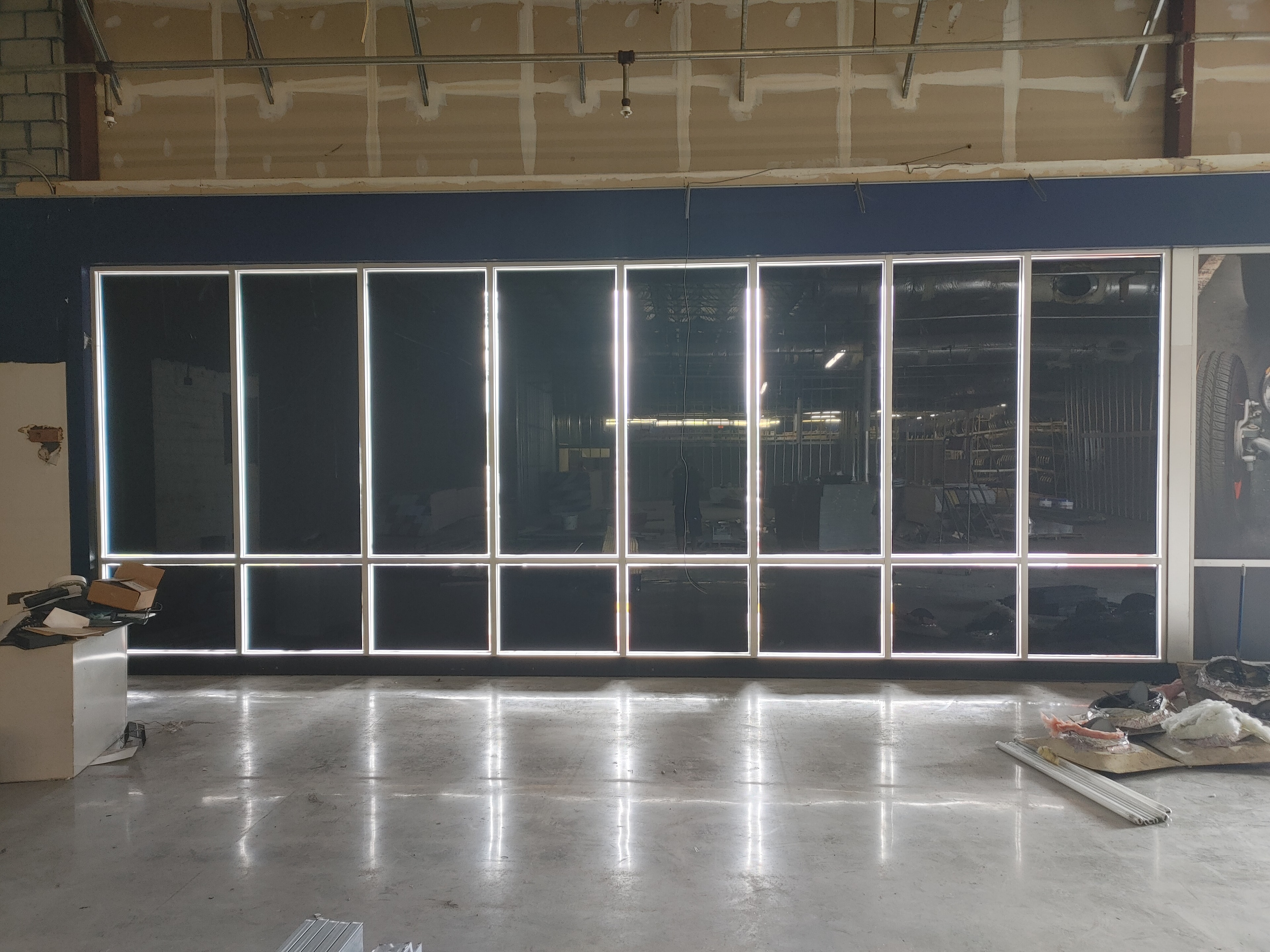 Decorative window film applied to modern storefront